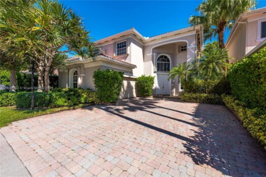 unny Isles single-family home right across the street from the ocean