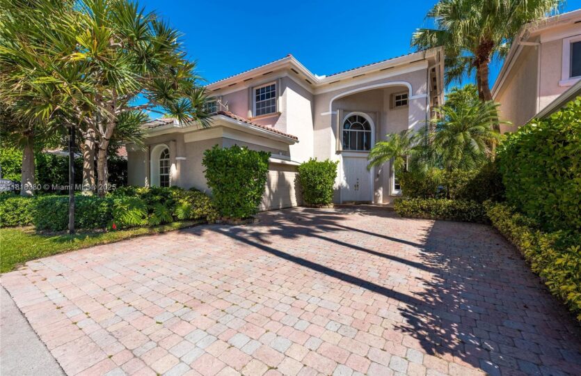 unny Isles single-family home right across the street from the ocean
